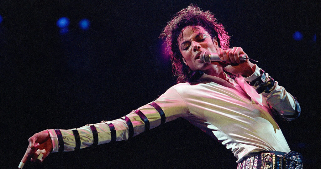 Michael Jackson performing during his bad tour.